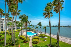 Aerial of Waterfront Pool + Resort Grounds