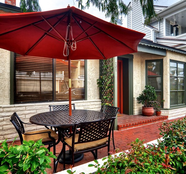 Cozy outdoor patio complete with a gas BBQ and patio furniture