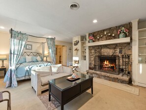 Primary Bedroom - King Bed, Seating Area, TV, Fireplace and En Suite Bathroom