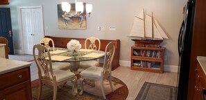 Dining area w/seating for 4. Bar seating for 3 also in kitchen area.