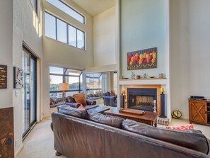 Living Room- Balcony + Fireplace