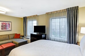 Get a good night's rest in the cozy bedroom.