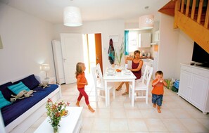Spread out in the open-concept living area which adjoins with the dining area.