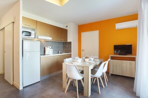 Prepare a meal in the equipped kitchen.