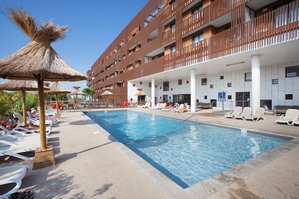 Go for a dip in the lovely outdoor pool.