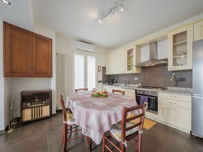Cabinetry, Furniture, Property, Countertop, Wood, Table, Kitchen, Lighting, Interior Design, Flooring