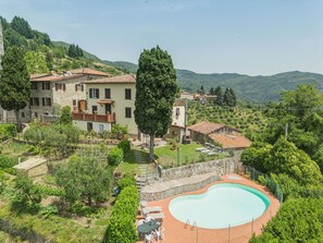 Water, Sky, Plant, Building, Tree, Land Lot, Natural Landscape, Urban Design, Mountain, Swimming Pool