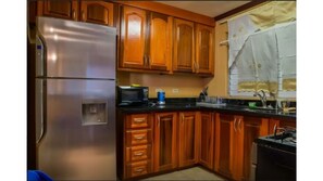 Fully Functional kitchen with toaster, coffee maker, microwave .etc 