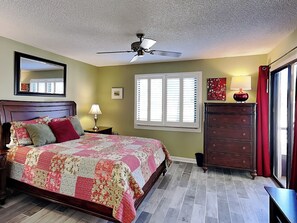 Primary Bedroom - Queen-Size Bed, Patio Access & Ensuite Bathroom