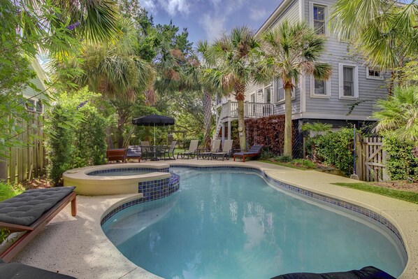 Backyard paradise with pool and hot tub.