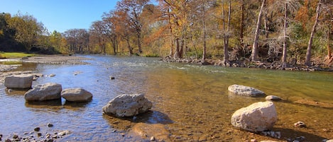 Interested in tubing or just kicking back for a restful vacation as you listen to the sounds of the river below the beautiful deck? If so, this home is perfect for you.