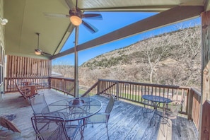 Large, covered deck is perfect for kickin' the ole feet up after a busy river day!