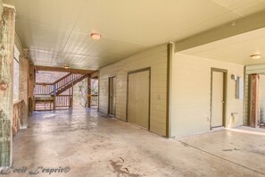 A large car port is the perfect spot to toss washers and catch a break from the sun.