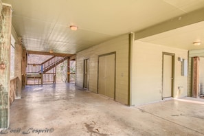 A large car port is the perfect spot to toss washers and catch a break from the sun.