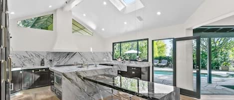 Exquisite marble finishes throughout the kitchen, beautiful crafted and designed