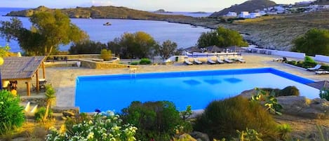 Olympic size pool for the residents with pool bar, sunbeds, with sea view