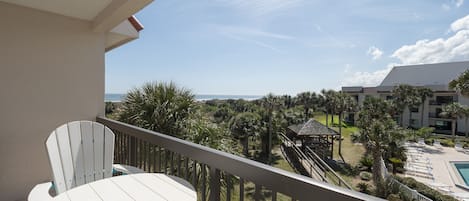 Dine Outdoors - The balcony is the ideal place to enjoy a tasty meal while you breathe in the salty breeze floating in from the nearby ocean.