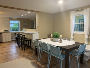 Diner table and custom bench that fits 8-10 people
plus 4 seats at the counter