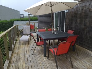 private outdoor eating area with gas grill