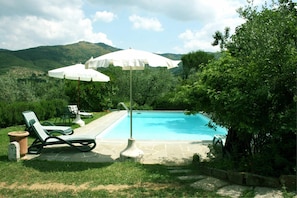 Water, Plant, Sky, Cloud, Umbrella, Azure, Swimming Pool, Shade, Outdoor Furniture, Tree