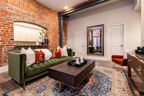 Open concept living and dining area with ample comfortable seating for you and your guests. 55" Samsung Smart 4K TV that allows for streaming from your favorite apps, along with the DIRECTV Entertainment.