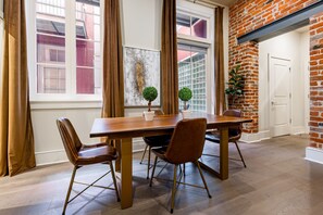 Open concept living and dining area with ample comfortable seating for you and your guests. 55" Samsung Smart 4K TV that allows for streaming from your favorite apps, along with the DIRECTV Entertainment.