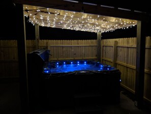 The hot tub looks extra magical at night.