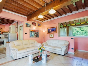 Furniture, Couch, Property, Window, Living Room, Interior Design, Lighting, Picture Frame, Floor, Wall