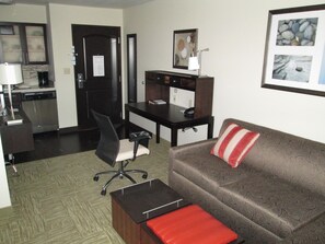 Kick back your feet and relax in the cozy living area.