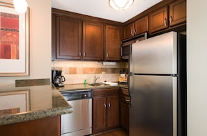 Prepare a meal in the equipped kitchen.