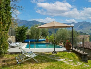 Cloud, Plant, Sky, Water, Furniture, Swimming Pool, Mountain, Shade, Outdoor Furniture, Umbrella