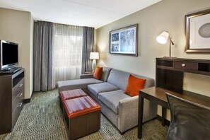 Sink into the cozy sofa after a day exploring the area.