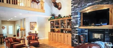 Great Room with fire place and smart TV