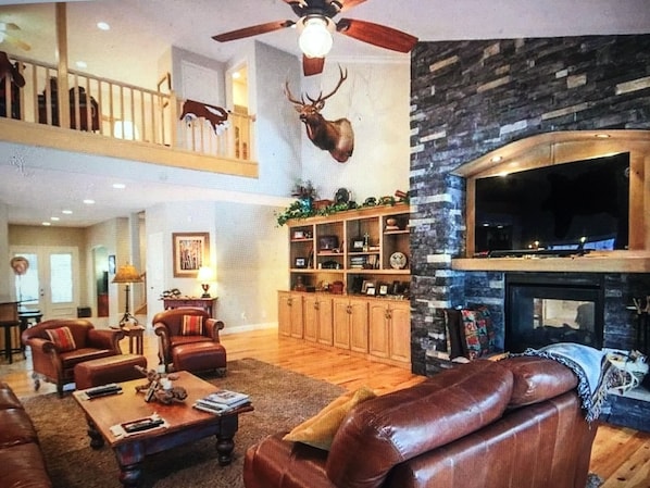Great Room with fire place and smart TV