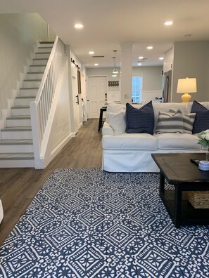 Living Space View with Stairs to Second Floor Bedrooms and Baths