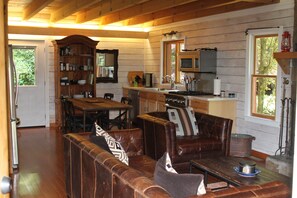 Open kitchen and living room, loft above.  