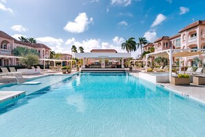 CHECK OUT THE SOPHISTICATED ARCHITECTURE OF THE SOUTH POOL &  SWIM UP POOL BAR.