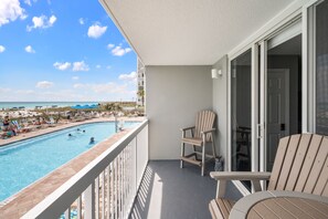 Updated patio with an AMAZING view of the gulf front pool and the beach.