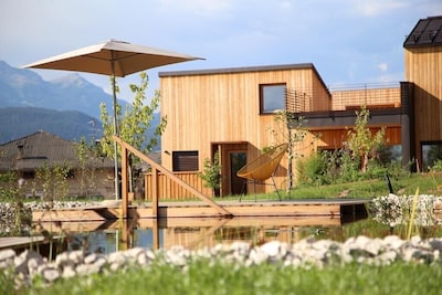 Landhaus Silene: new + modern wooden house with large natural garden and swimming pond