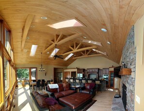 Great Room / Kitchen with stone faced gas fireplace
