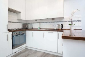 Modern, fully equipped kitchenette. 