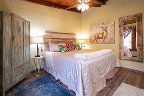 New King bed in master, new linens, ensuite bathroom, two marvin windows to deck