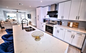 Open kitchen with Coffee bar and high end appliances