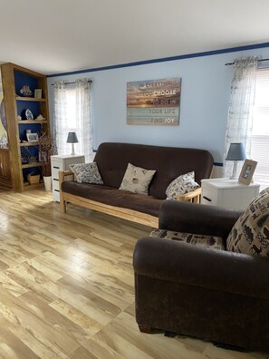 Living room with comfortable futon couch/bed