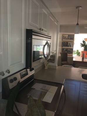 Microwave and oven/stove.