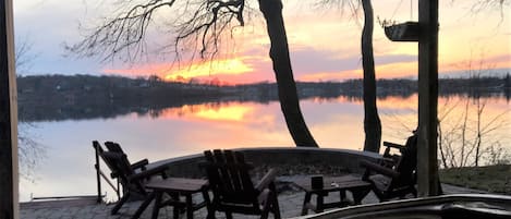 Hot tub view of fire pit and lake