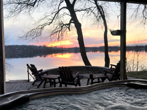 Hot tub view of fire pit and lake