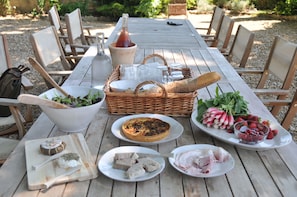 Provencal lunch under the great Plane tree in the courtyard
