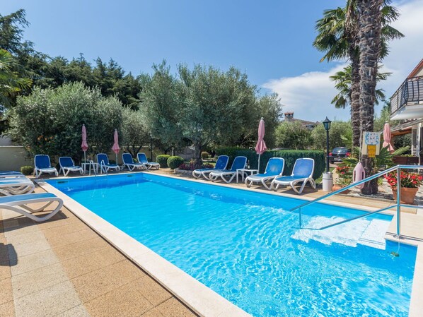 Water, Sky, Building, Cloud, Swimming Pool, Blue, Tree, Shade, Chair, Outdoor Furniture