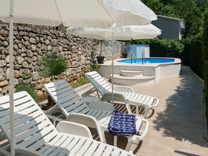 Furniture, Property, Chair, Plant, Outdoor Furniture, Shade, Interior Design, Lighting, Sunlounger, Swimming Pool